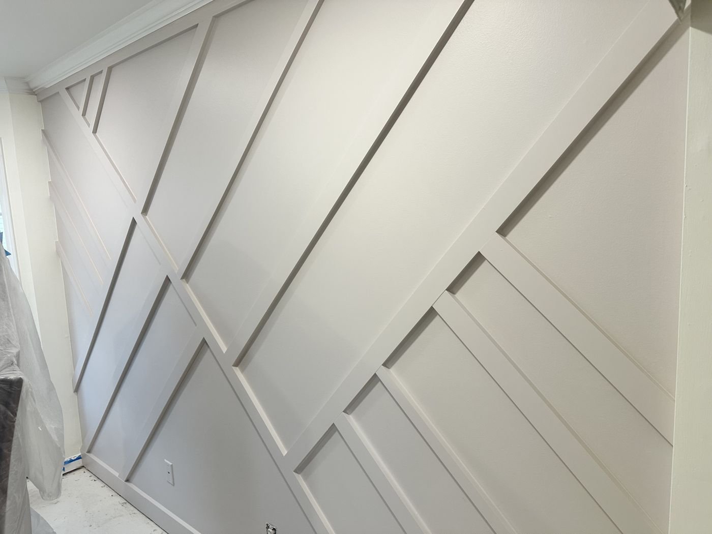 Finished white geometric accent wall — Triangle Home Handyman, Apex NC