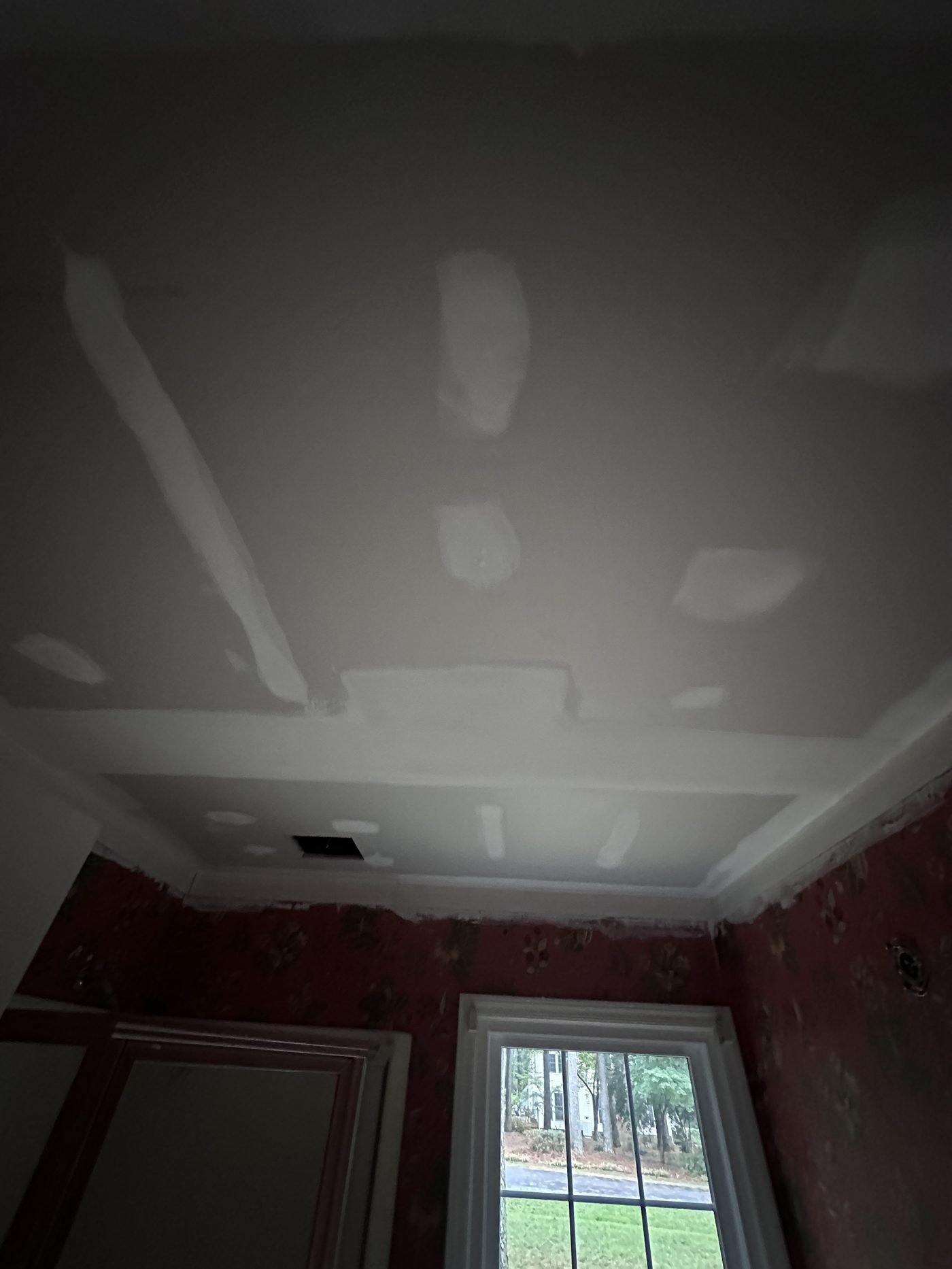 New drywall ceiling installed and prepped for paint, recessed tray detail