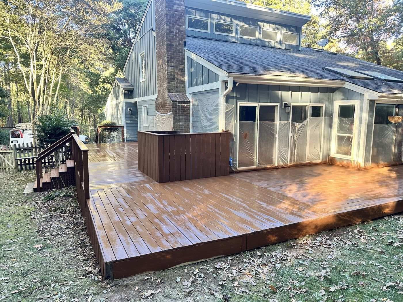 Freshly stained backyard deck and railing — Triangle Home Handyman, Apex NC
