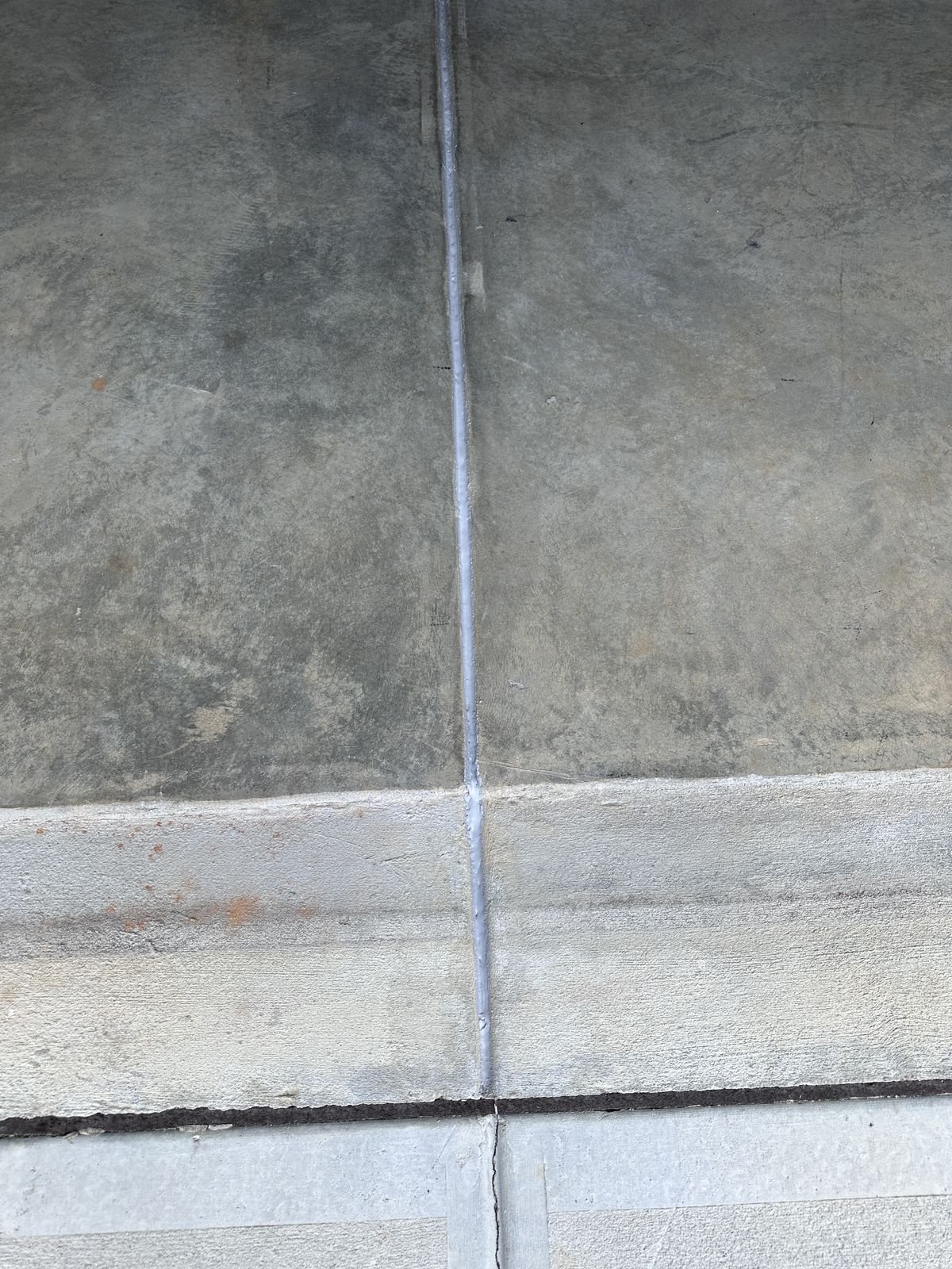 Garage floor joint filled and sealed after repair — Triangle Home Handyman, Apex NC