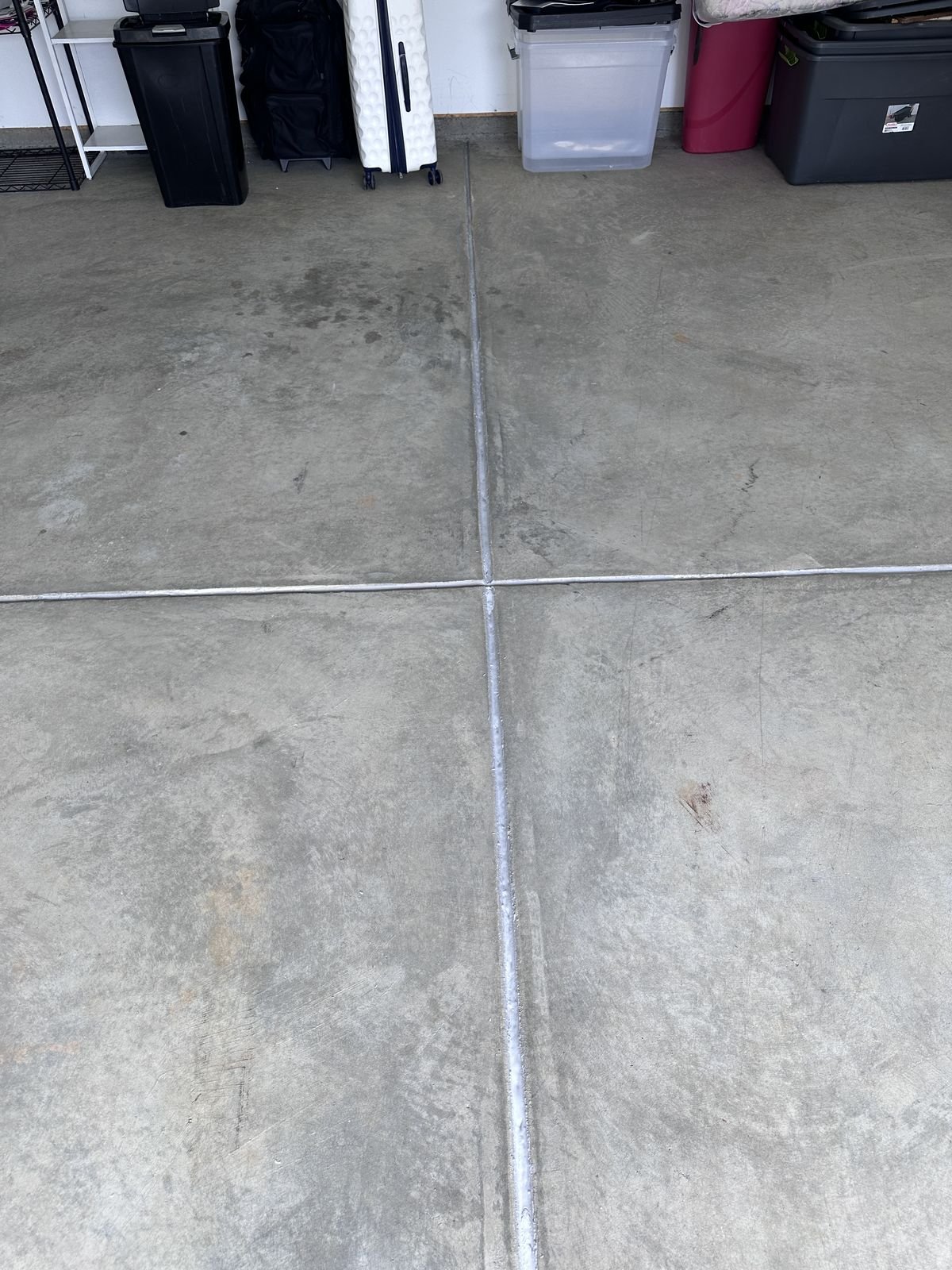 Garage floor with repaired cracks along the slab joints — Triangle Home Handyman, Apex NC