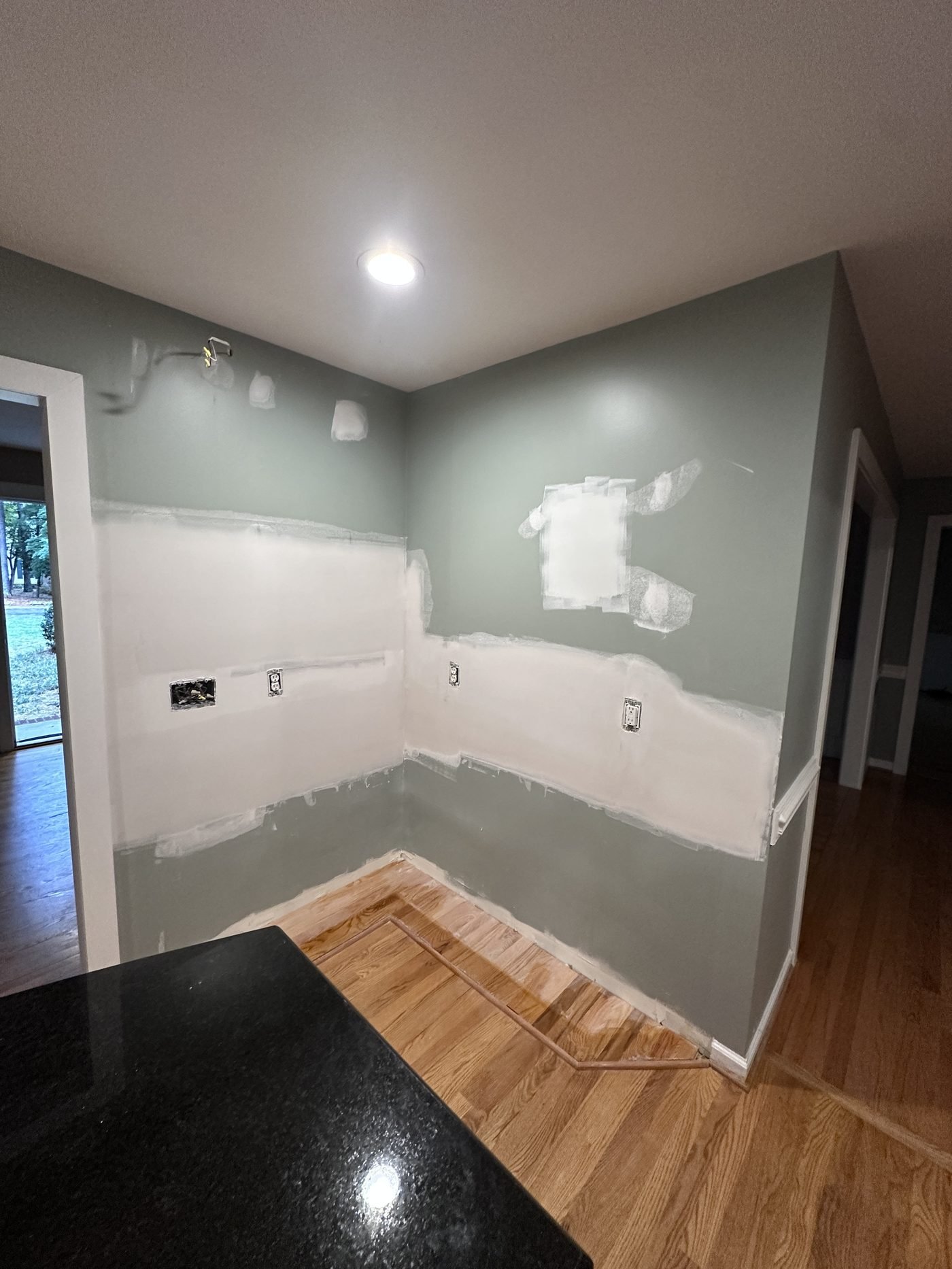 Finished drywall repair, sanded and primed, ready for paint