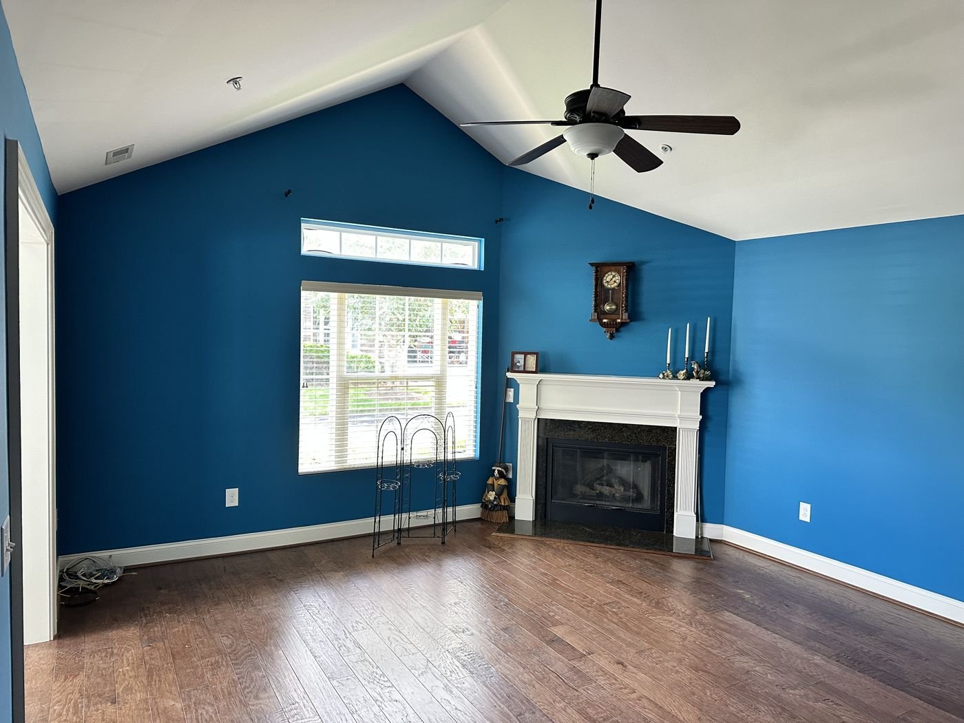 Ceiling fan with light kit in a vaulted living room — Triangle Home Handyman, Apex NC