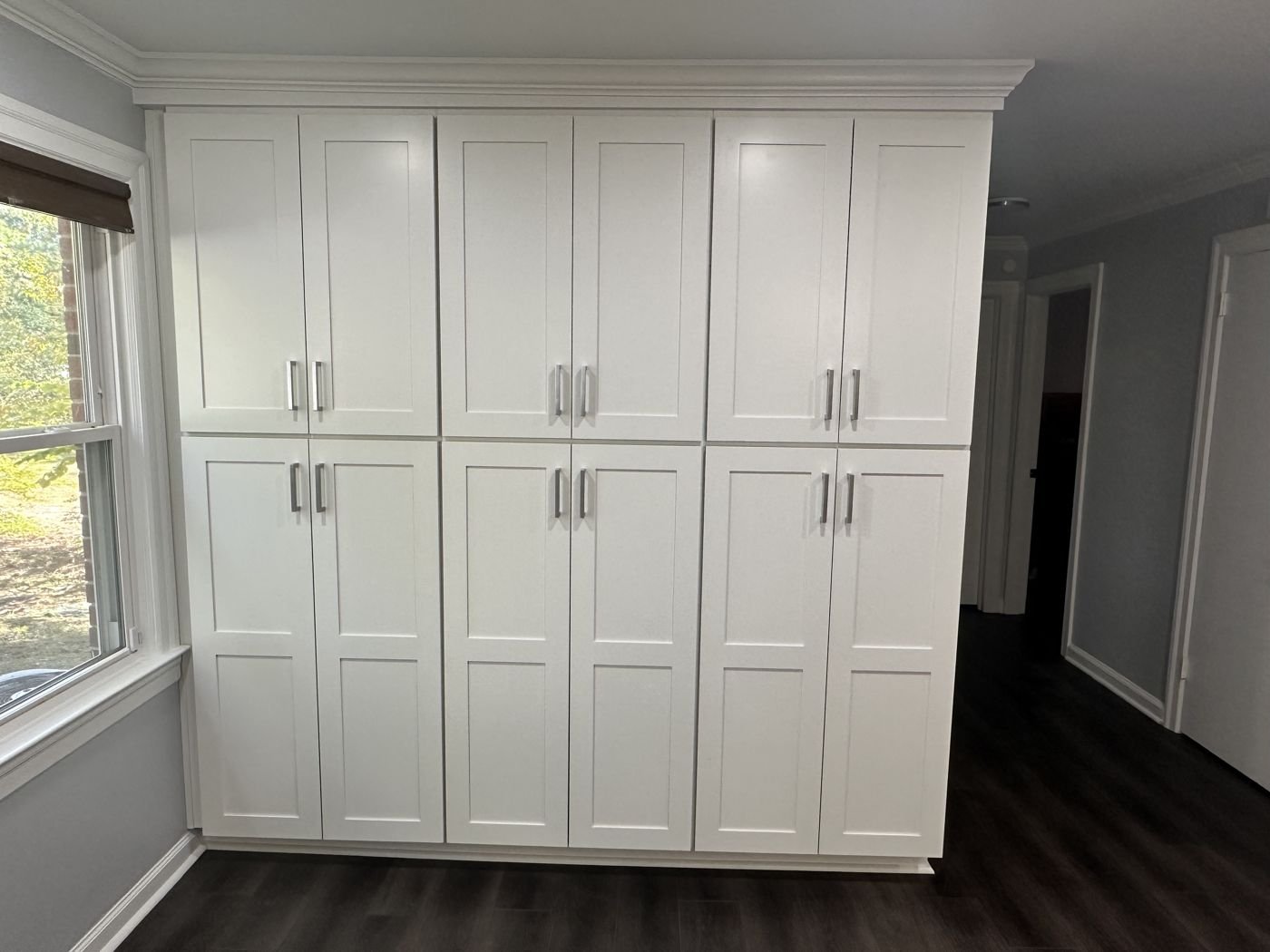 Floor-to-ceiling white shaker storage cabinets — Triangle Home Handyman, Apex NC