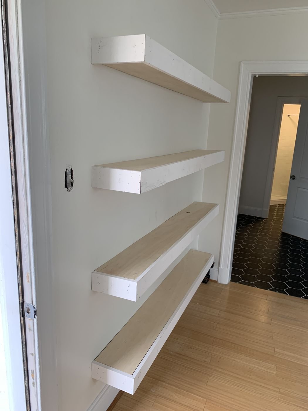 White floating shelves installed in an alcove — Triangle Home Handyman, Apex NC